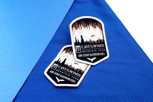 Woven Girl Scout event patches with fine cave artwork