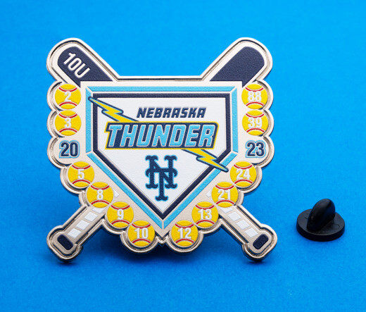Nebraska Thunder softball trading pin with numbered softballs